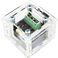 Kleiner, transparenter elektronischer Baustein mit schwarzer Platine, grünem Anschlussblock und Schrauben, die das Gehäuse sichern.